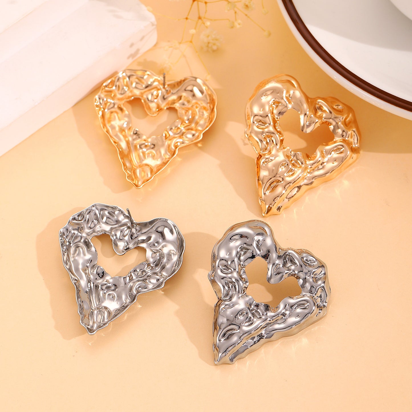 New Pleated Lava Hollow Heart-shaped Earrings