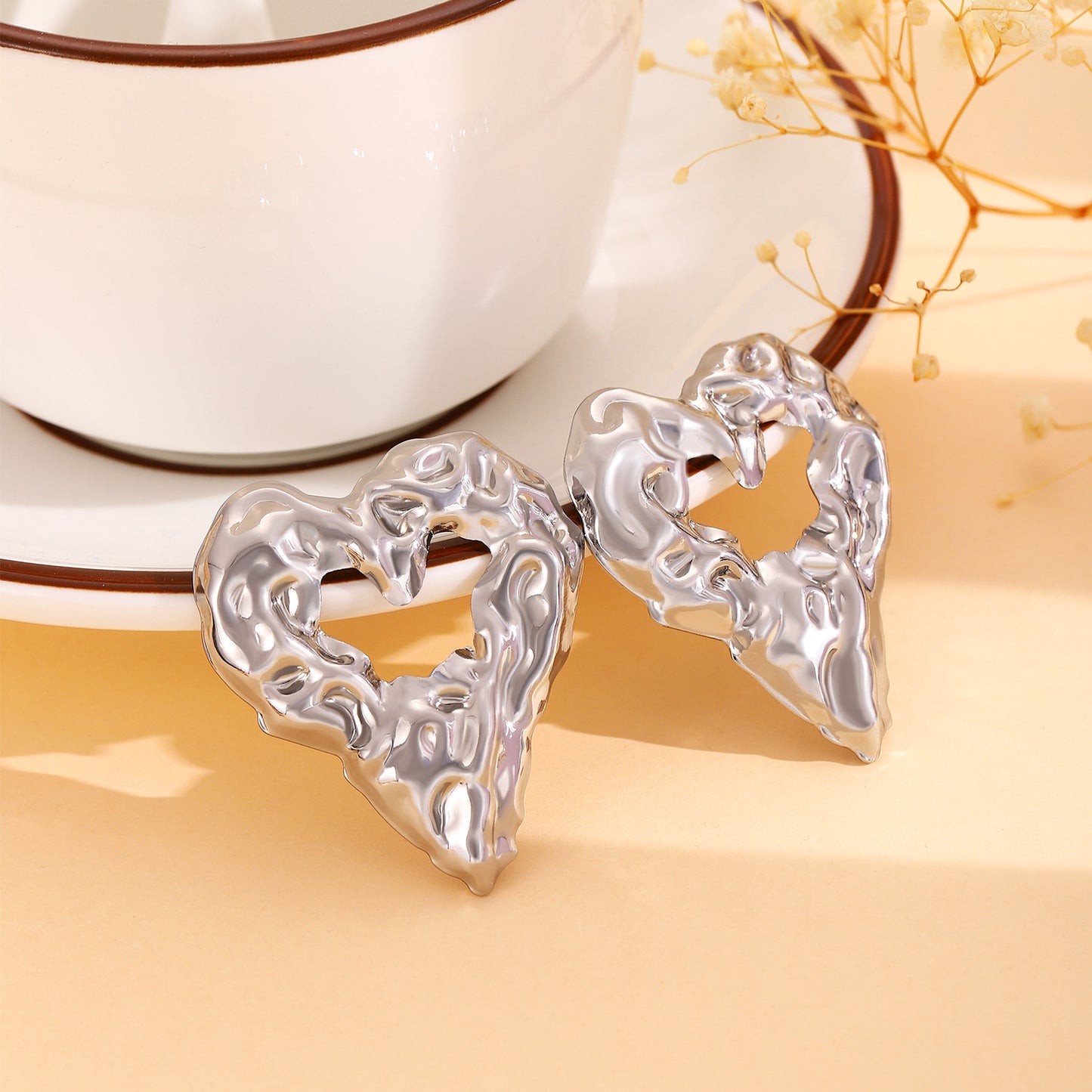 New Pleated Lava Hollow Heart-shaped Earrings